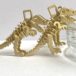 ミニチュア恐竜チャーム🦖 化石風 金色 骨格 模型 ティラノサウルス 個性派 個性的 クール かわいい インパクト 大ぶり 存在感 チャーム ペンダント