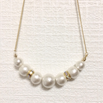 ロンデル入り 7粒コットンパールネックレス