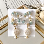 【pierce ❁︎ earring 】うねうねお花のリング × 上品コインパール color▶Light BLUE