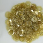 スパンコール 6mm 約360枚(約4g) 亀甲 半透明 オリーブ色 (SKK06BOVHL00)