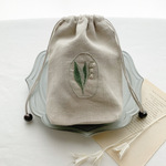 すずらんの刺繍のリネンの巾着ポーチ