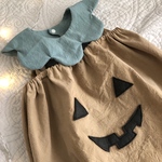 くすみカラーのハロウィンカボチャベビー服とスタイ