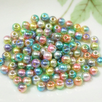 虹色パール　プラスチックビーズ　６mm　１０g　110個前後    C-7