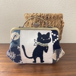 ミナペルホネンとpjcクロッチくんで作成しましたがま口ポーチです