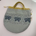 ミナペルホネン forestwing×millefioriの巾着バッグ