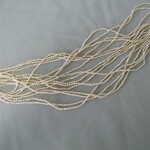 淡水真珠　2-2.5mm　ライス　薄いオレンジ　50cm連