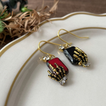 スカルハンドの耳飾り