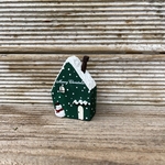 緑の雪だるま付きクリスマスのおうち