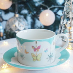 〖 煌めくバタフライゴーラウンドカップ＆ソーサー 〗  食器　蝶　クリスマス　雪