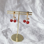 再販𓐍 𓈒◌𓂃さくらんぼ🍒ピアス orイヤリング ゴール クリアガラスビーズ 秋 冬
