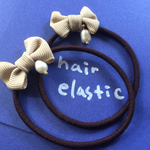 ﾊﾟｰﾙ付きリボンヘアゴム《ベージュ》