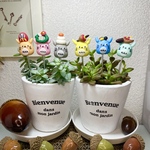ハンドメイド  ガーデンピック　頭にお正月飾りを乗っけたピック　多肉植物
