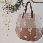 ミナペルホネン☆ bonheur  brown mix ☆ 本革ハンドルのぐるりと合皮パイピングを施したまあるいぺたんこバッグ