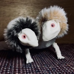 二首の彼等。