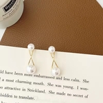 【再販】螺旋ダブルパールピアス