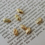 ヴィンテージ ルーサイトゴールドひねりビーズ10×5mm(6個)