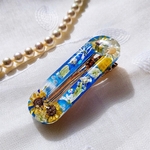 「ひまわり、空、雲」のようなレジンヘアクリップ109