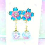ꫛꫀꪝ✨数量限定❣液体ガラスドーム 2022 スワロ 桜ピアス パール ピンク×水色