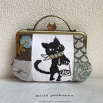 ミナペルホネンファブリックとpjcクロッチくんで作成しましたがま口ポーチです