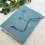 刺繍ブックカバー　ターコイズブルー×ピンク花
