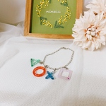 レジンで作った〇□△×のバックチャーム（ハンドメイド）