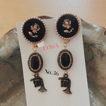 アンティークボタンと真鍮ホルンのイヤリング