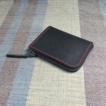黒のヌメ革のL字財布