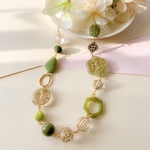 [再販]グリーン✳︎クリアーゴールド✳︎お花のネックレス