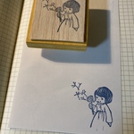 綿毛を飛ばす女の子