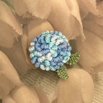 レース編み♪コイル編みのコロンと丸いお花ブローチ