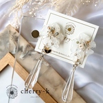 white flower × clear drop pierce