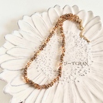 ブラウンカラーのネックレス