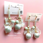クリアフラワー×ポンポンフリンジ　ピアス/イヤリング