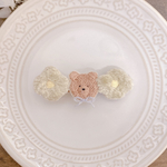 茶色くまさんとふわふわお花刺繍のヘアクリップ🐻🌷