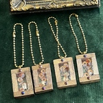 【限定！当店オリジナル】ウッドフレーム オルゴナイト バッグチャーム ガーネット&タンザナイト入り