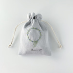 リネンの巾着ポーチ　ローズマリーのリース手刺繍