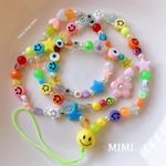 ロング☺︎ビーズストラップ⭐️スマホストラップ⭐️ネックストラップ⭐️ネックレスストラップ☺︎ニコシャインカラフル☺︎/MIMI.