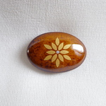 茶そば釉薬にお花風模様の帯留め（三分紐用）