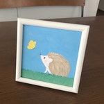フレーム付き　蝶々とハリネズミイラスト