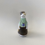 ①がまぐちの猫　見上げる（三毛）