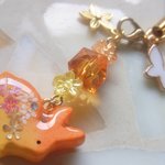 ◇853　オレンジペコ　🍊うさぎと蝶々のストラップ🐇（イヤホンジャック）