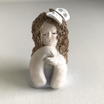 蝶がとまった居眠りレディ