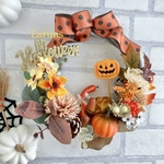 オレンジパンプキンと秋の小花たちのハロウィンリース玄関リース22〜23センチ直径ハロウィンカラードットグログランリボン使用