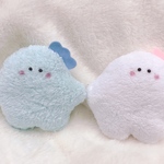 きょうりゅうもにゅさんのぬいぐるみ