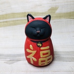 黒達磨にゃんの置物☺️