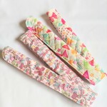お名前タグつき ずれが気にならない♡ 超ロング 水筒ベルトカバー 【カラフルリボン】ピンク