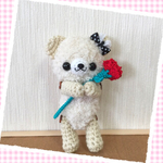 カーネーションを持ったクマちゃん