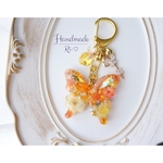 お花いっぱい蝶々チャーム*:.＊イエローオレンジ