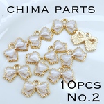 【レビュー投稿でチャームプレゼント】リボンチャーム　白色　10コ　＃ハンドメイド　パーツ　エポチャーム　ホワイト