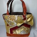 袋帯リメイク ミニバッグ  リボンチャーム付き ゴールド＆赤